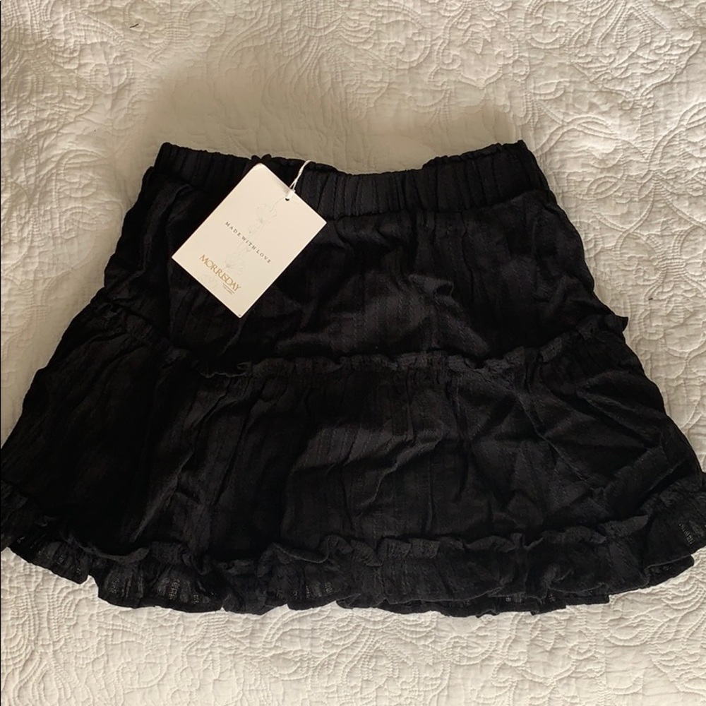 Mini black ruffle skirt